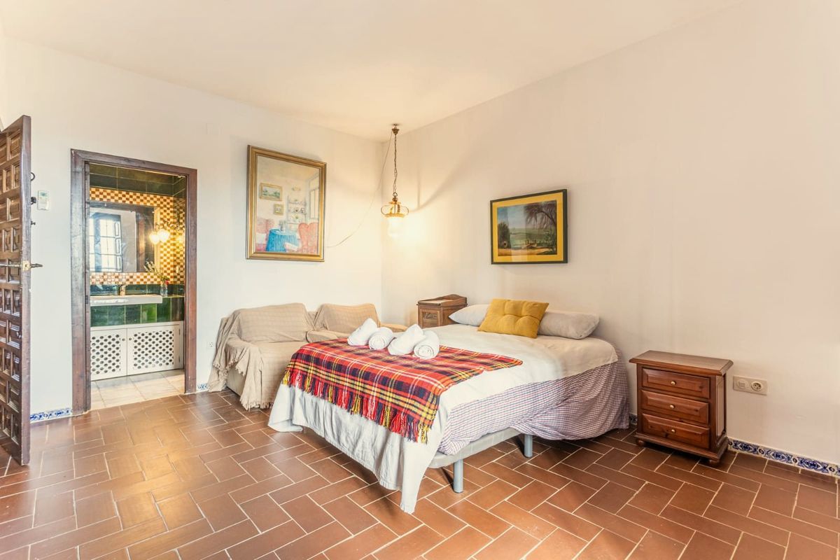Dormitorio con baño incorporado